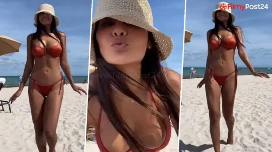 Esha Gupta Kisses the Cam as She Sizzles in a Horny Orange Bikini (Watch Video)